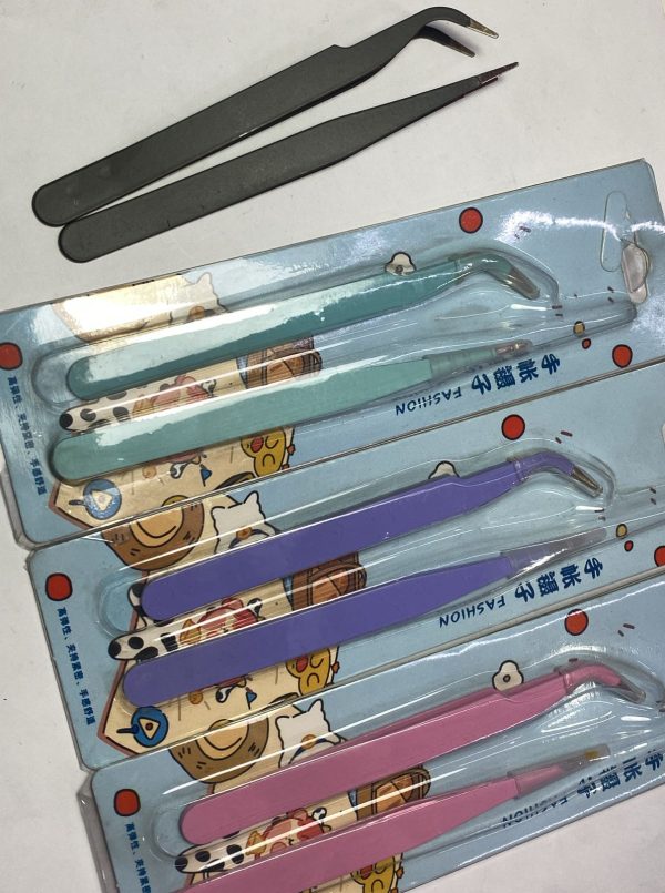 Dúo de pinzas para stickers