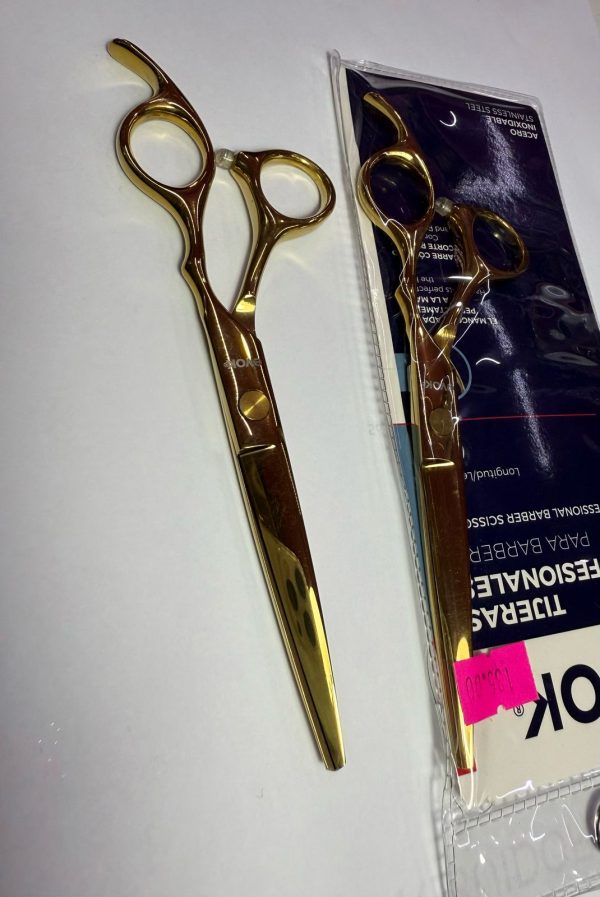 Tijera dorada para barbero